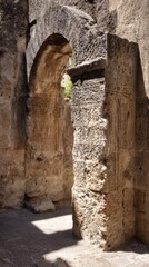 jamb. Ancient stone archway jamb with carved textures in sunlight. real-estate listings, architecture portfolios, designed for real-estate listing and luxury residence showcases.
