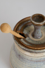 Details of a ceramic honey pot