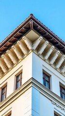 entablature. Classical architecture cornice featuring conical guttae details under soft window light. real-estate listings.
