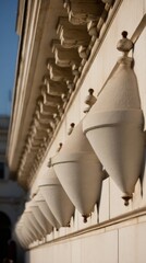 entablature. Classical architecture cornice featuring conical guttae details under soft window light. real-estate listings.
