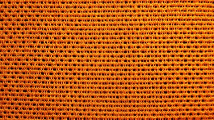 Close-up of Orange Woven Mesh Fabric
