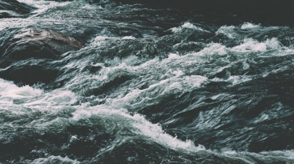 Dynamic Flow of Rippling Water Over Rocks in a Serene Natural Environment Capturing the Beauty and Power of Nature's Untamed Force