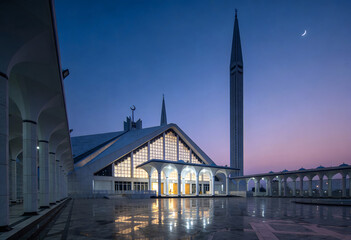 Naklejka premium Faisal Mosque Islamabad Pakistan at Dusk with Crescent Moon and Stars architecture