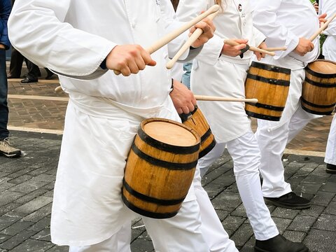 White-Clad Drummers in Parade, San Sebastian day