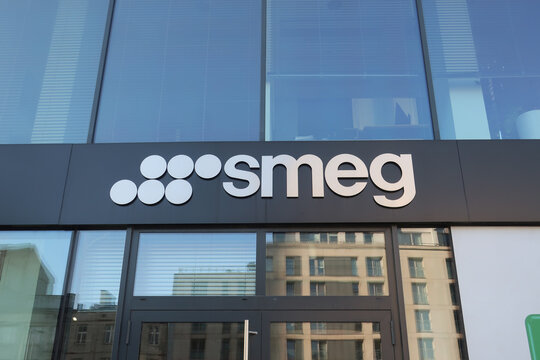 Smeg households appliances company office with signage, logo, emblem on the facade. WARSAW, POLAND - MAY 21, 2023