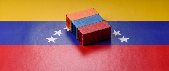 Cargo containers on the Venezuela flag, conceptual backdrop for goods logistics. Cargo containers