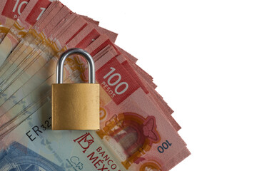 A padlock on Mexican peso banknotes. Financial security, money protection, and economic security.