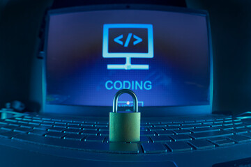 Coding Security On Laptop With Padlock Shield Emphasizing Digital Protection And Safe Computing
