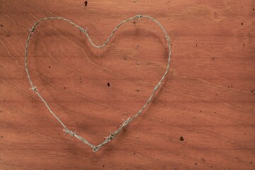 Concept of difficult, painful or forbidden love with wire.