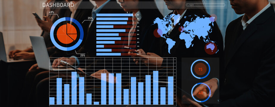 Business professionals engage with digital dashboard displaying financial graphs and global data, highlighting analytics and strategic insights for decision-making. Axiom - Powered by Adobe