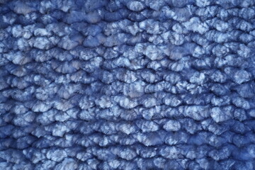 Blue fleece fabric texture background Close-up texture of soft blue fleece fabric. Abstract textile background with fluffy material and cozy fabric surface. © Анна Климчук