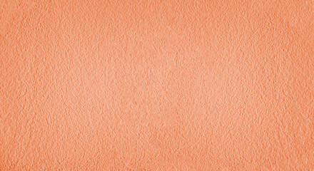 Fototapeta premium red pink plaster wall texture. Seamless surface abstract solid background Pale painted wall built structure textured stucco in terracotta color. seamless texture of plaster backdrop pattern Peach Fuzz