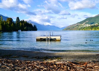 Swimming pontoon on Lake Wakatipu in Queenstown, New Zealand © Australian Stock