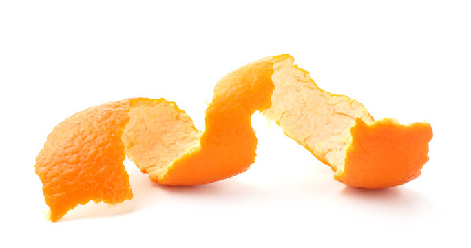 Tangerine zest isolated on white. Citrus fruit peel