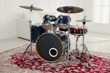 Modern drum kit in studio, closeup. Musical instrument