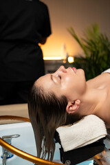 Professional hair care procedure focused on relaxation, hydration, and healthy scalp treatment.