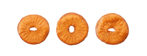 Salted round squeezed pretzels isolated on white background top view. Crunchy beer snack.