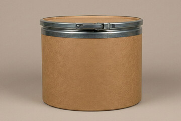 Front view of a large industrial brown fiber drum with a metal locking ring mechanism