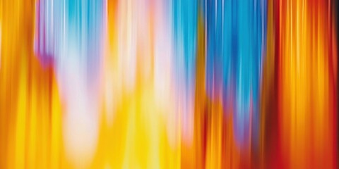 Abstract background featuring vibrant gradient of blue yellow and orange with blurred motion effect. Modern colorful texture for creative projects.