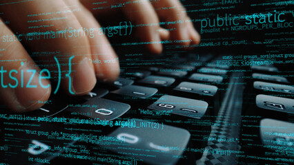 Close-up of hands on a keyboard, showcasing a dynamic coding environment with glowing text reflecting the essence of software development and technology. Xenic