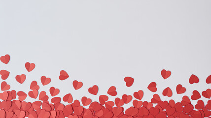 Scattered red hearts on white background