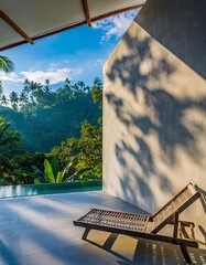 Luxury tropical villa terrace with lounge chair and nature view
