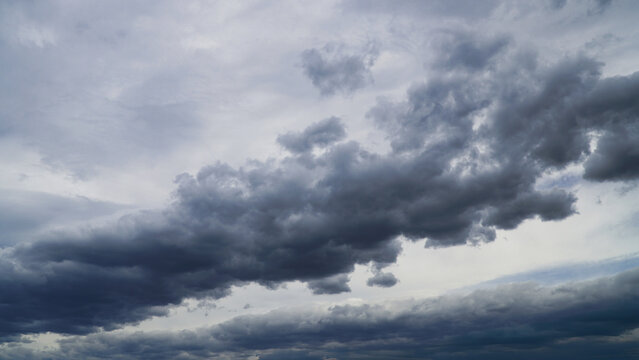 Cumulonimbus clouds over grey sky a moody dramatic atmosphere weather