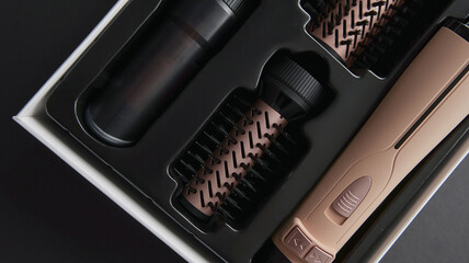 Luxury hair styling tool set with attachments in elegant packaging