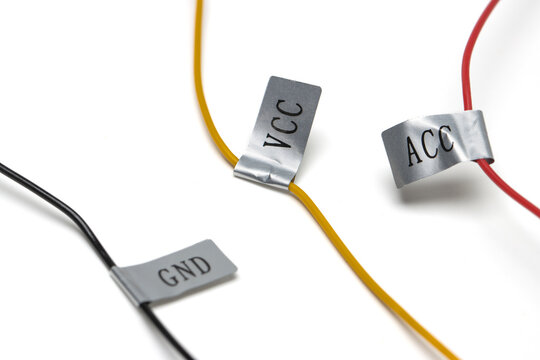 labels on automotive wiring harness, showing ACC for Accessory Power, GND for Ground and VCC for Constant Power.