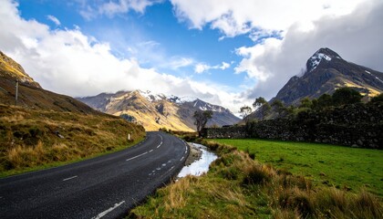 Winding Road Through Mountains with Cloudy Sky