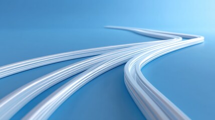 Smooth flowing white lines on a light blue background creating a calming and modern aesthetic suitable for creative and abstract design concepts
