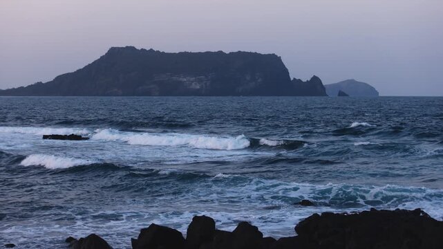 Jeju-do, Seongsan Ilchulbong  landscape, volcanic tuff cone, Sunrise peak, Jeju Island, South Korea, Seongsan-ri, Seogwipo, Jeju Province landscape view in a sunny day, with sea, cliffs hiking trail