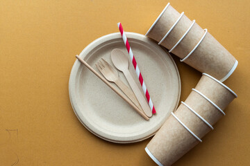 Eco Friendly Disposable Tableware Set on Kraft Background
