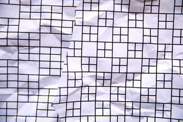 しわにした紙をちぎって重ねた背景素材