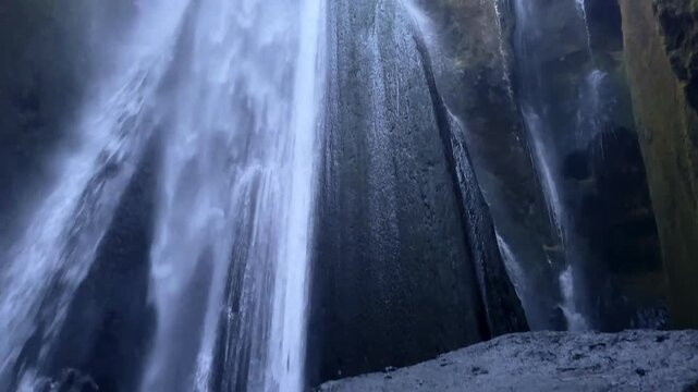 Tilt Shot Inside Gljufrafoss Cave Towards the Center Rock, Iceland.