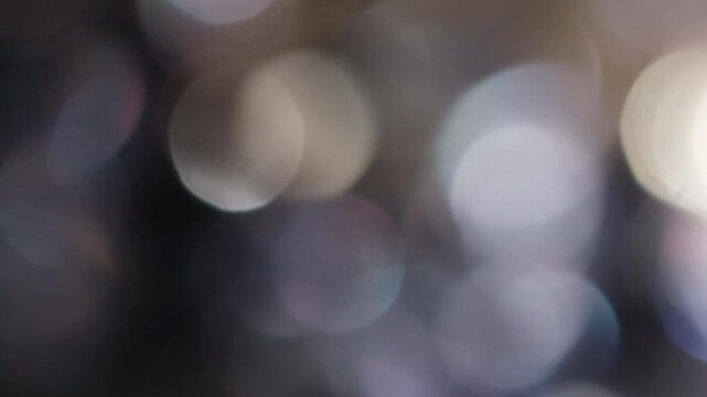 Rotating circular bokeh overlay clockwise motion 4K