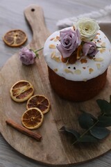 Fototapeta premium Traditional decorated Easter cake on wooden table