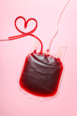 Blood donation bag with a tube shaped like a heart