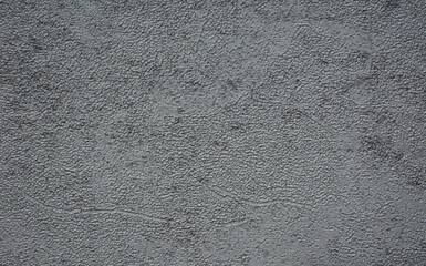 Fototapeta premium Gray plaster with traces of rough application, close-up.