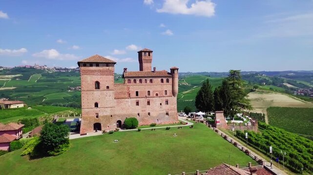 Grinzane Cavour, Italy - Medieval Castle, Vineyards, Hills Landscape - Cinematic Sky View