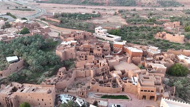 Aerial view of Ushaiger Heritage Village, traditional Najdi mud brick architecture in Saudi Arabian desert
