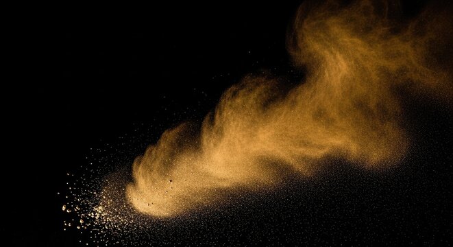 A cloud of golden dust against a black background.