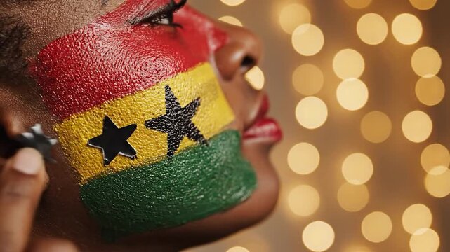 Ghanaian flag painted on woman's face