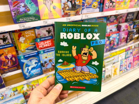 Diary Of Roblox Pro Kids Book Held In Toy Store Aisle