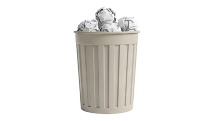 Trash can full of crumpled paper balls
