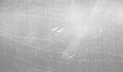 Vintage grunge scratched background, distressed old abstract texture overlays. Crumpled pattern for film poster or album cover.