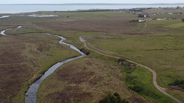 Drone shot of the Gress river, Broadbay and the village of Back on the Hebrides.