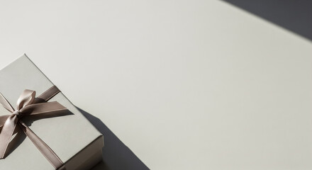 Minimal Gift Box with Copy Space on Neutral Background