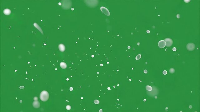 Slow motion white bubbles on green background, abstract cinematic footage
