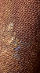 Close-up of Brown Fabric with Subtle Texture and Color Variations.